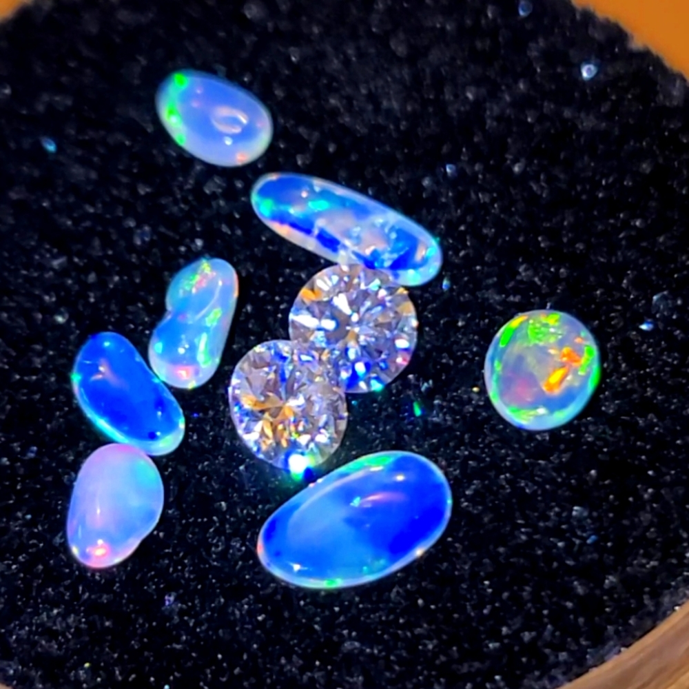 All natural multifire welo opals and vvs1 diamonds